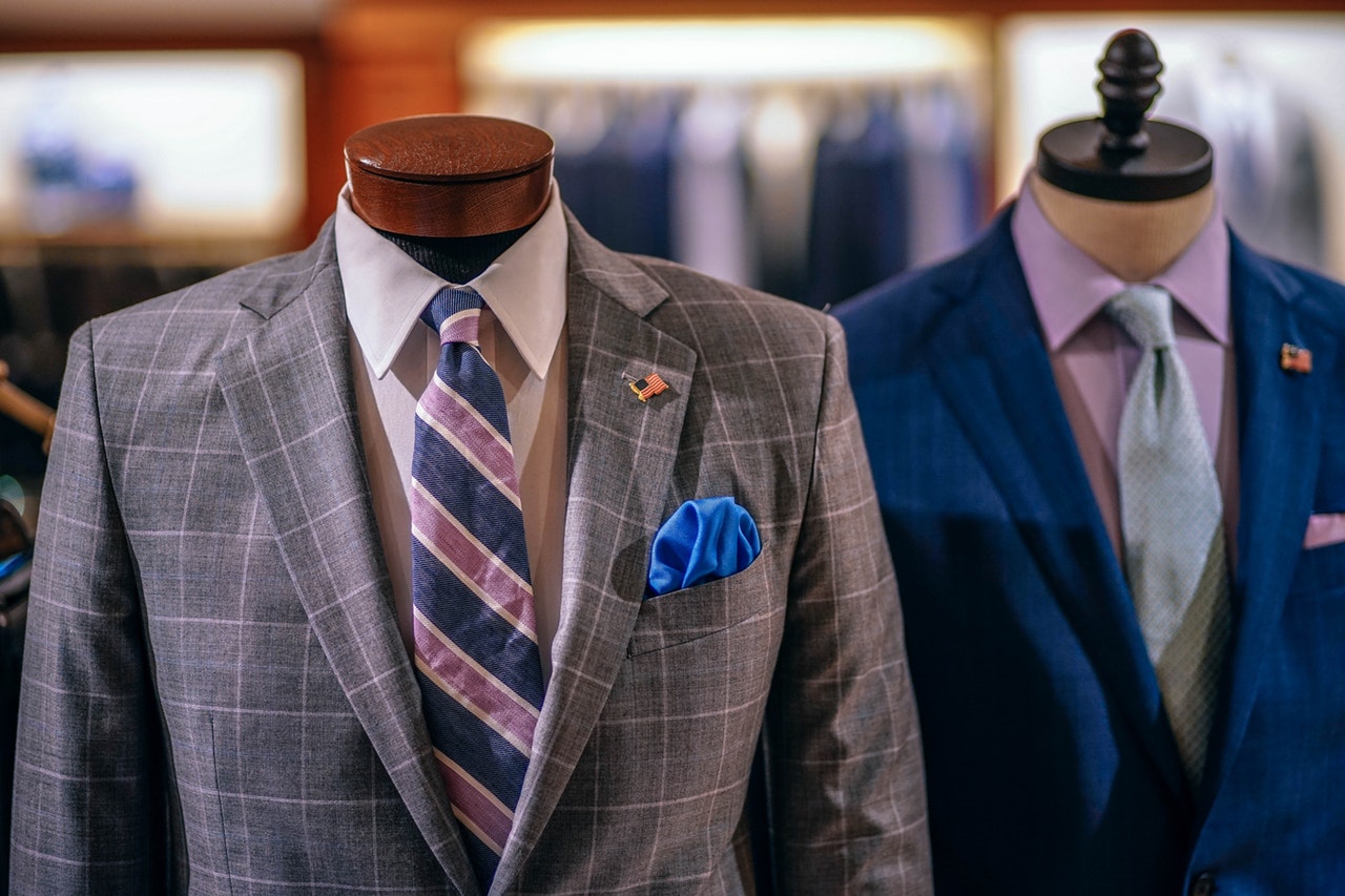 A photo of 'Headless' mannequins at a mens formal wear department store.